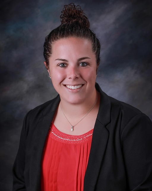 professional headshot woman with grey hair in elegant scarf, mature sophisticated styling, soft natural light portrait